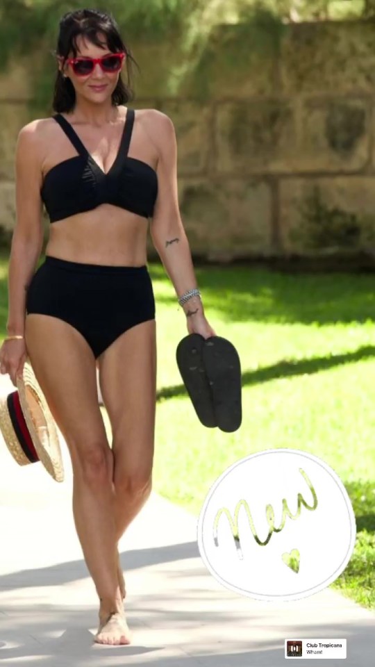 a woman in a black bikini is holding a pair of flip flops