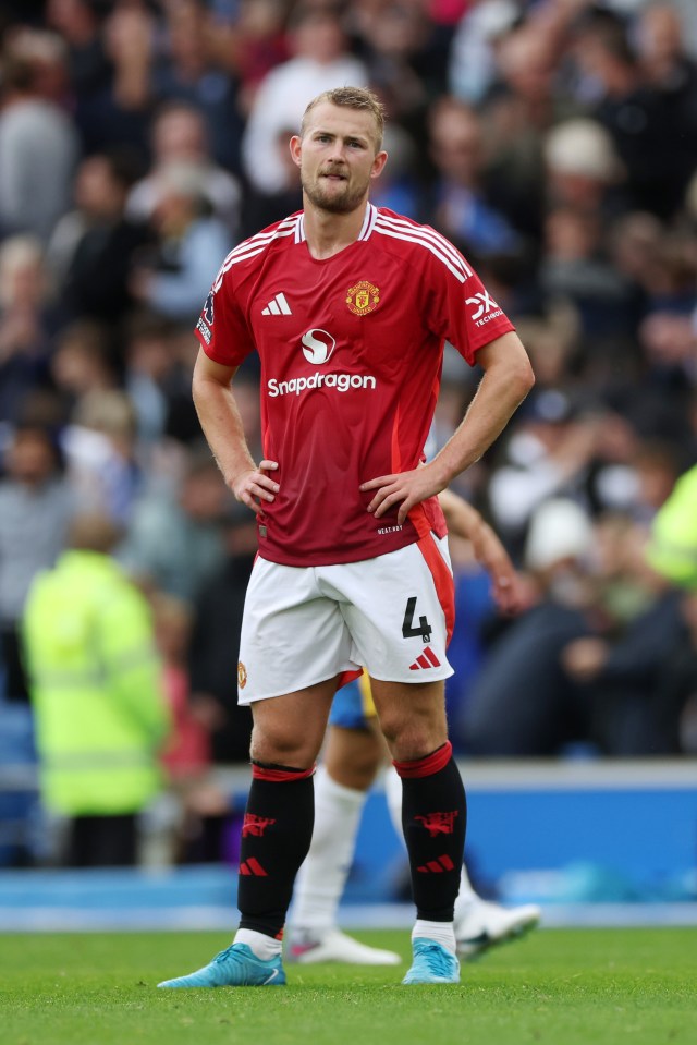 soccer player wearing a red shirt with snapdragon on it