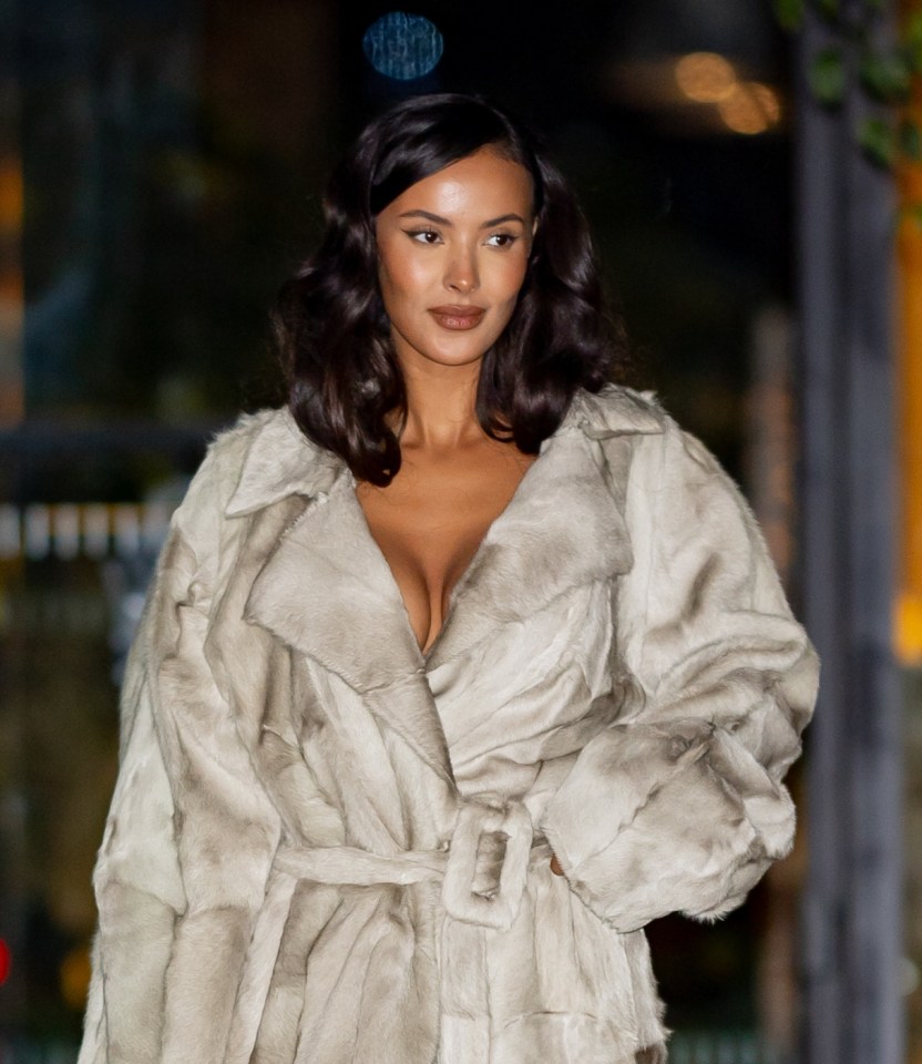 Maya showed off some chest in the comfy trench coat