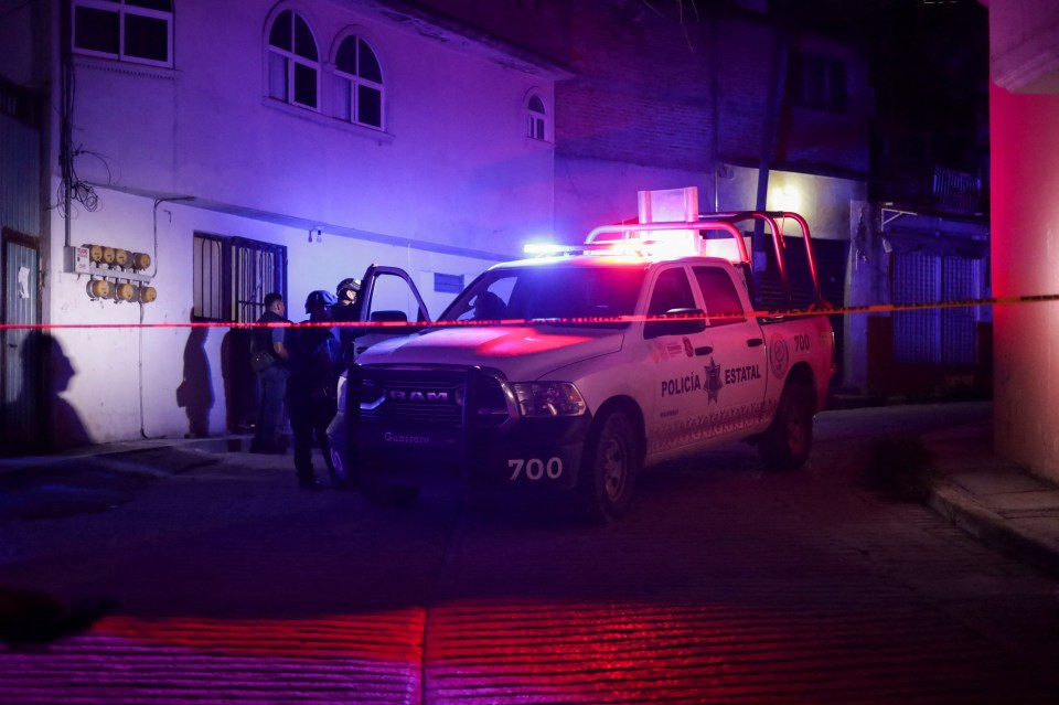 Mexican security forces respond at the scene where Arcos was killed