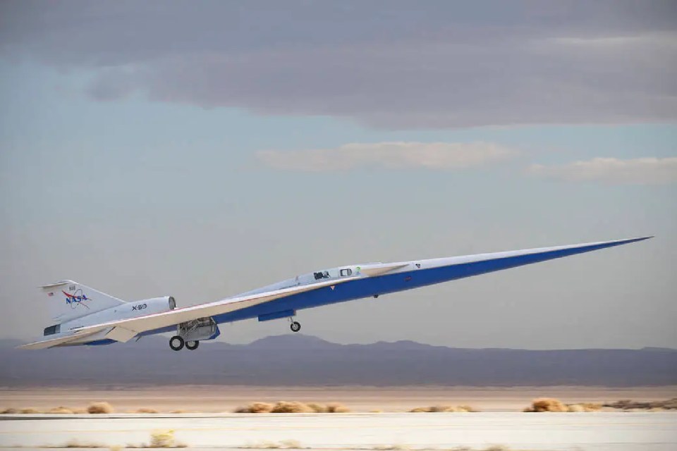 a nasa plane is taking off from a runway