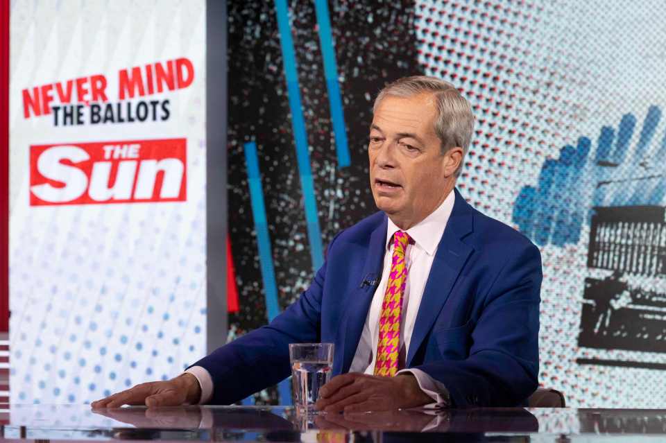 a man sitting in front of a sign that says never mind the ballots