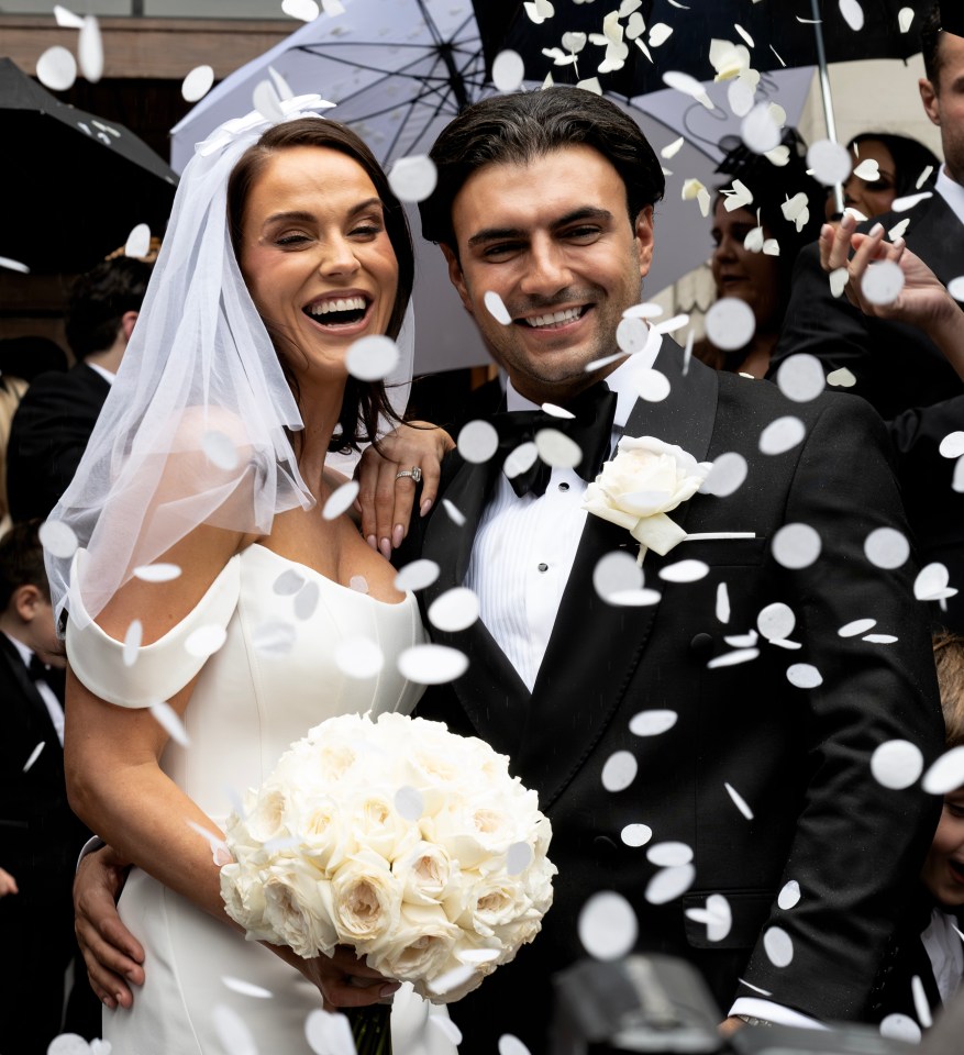 a bride and groom are being showered with confetti