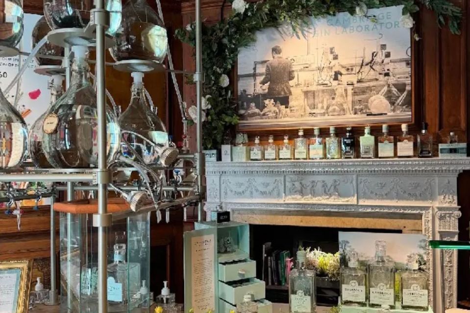 a display of bottles in a room with a sign that says " captain morgan gin laboratory "