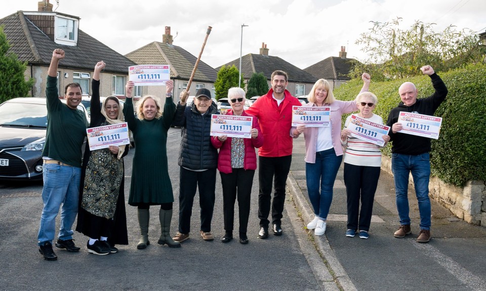 The group of neighbours all won £111,000 each