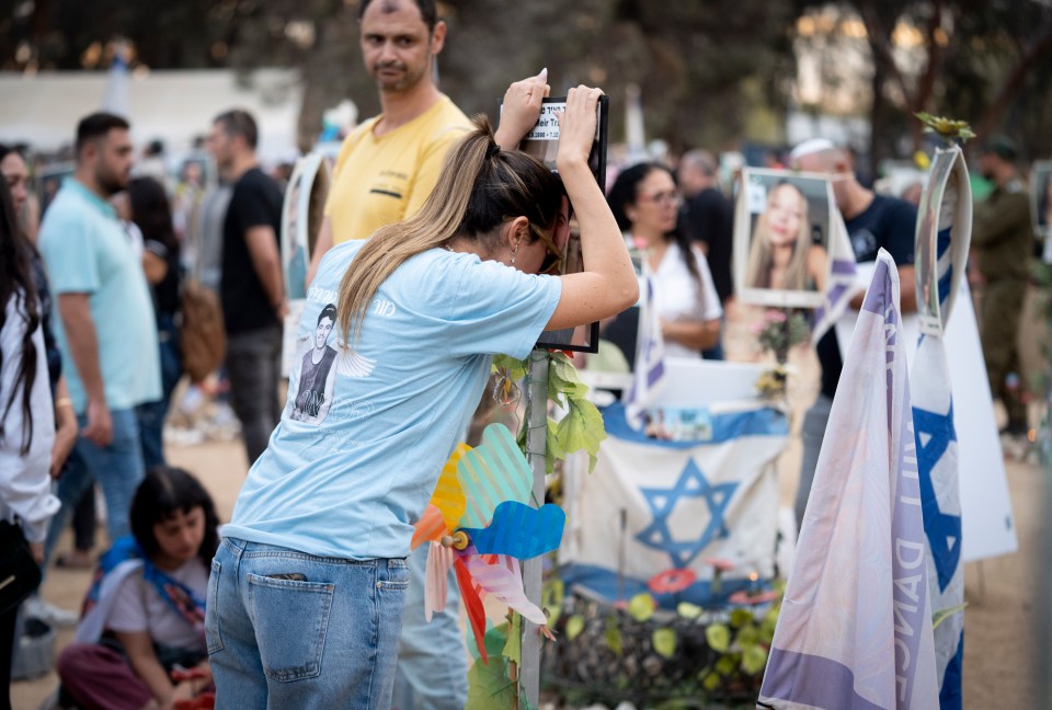 Devastated families pay their respects at a vigil