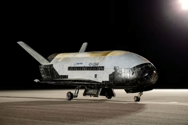 The USSF's X-37B Orbital Test Vehicle on a runway after a mission