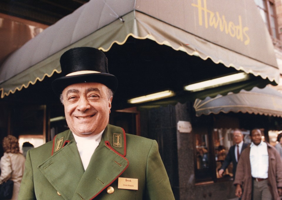 a man in a top hat stands in front of a harrods store