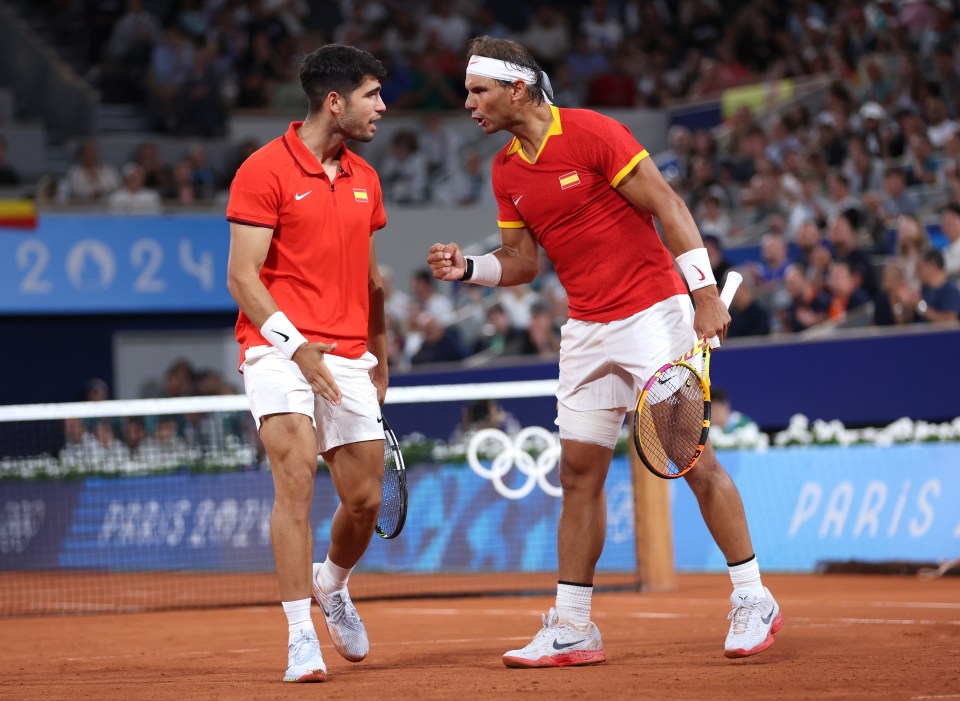 two tennis players on a court with the year 2024 in the background