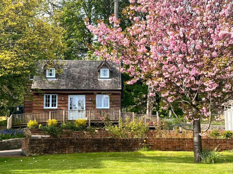 Paul O'Grady's estate boasts a 'witch's cottage' - 'where carved woodland creatures keep watch'