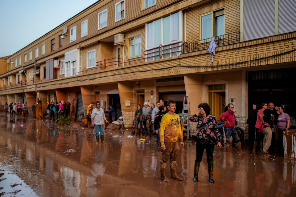 Streets and residents have been left covered in thick mud