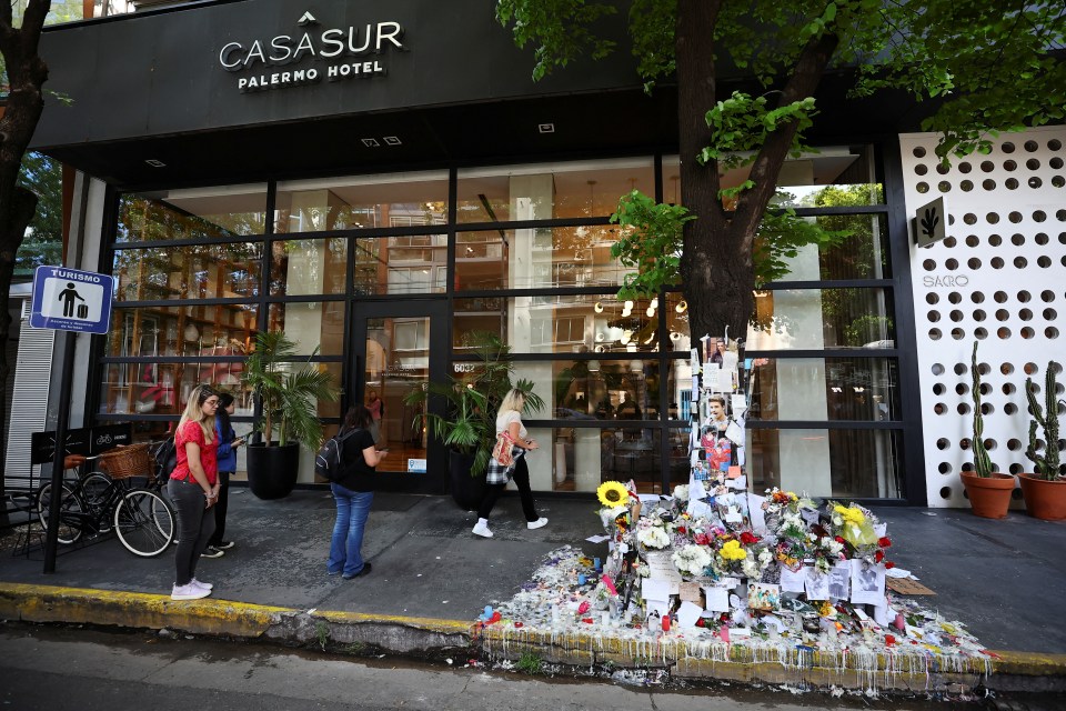 Fans have left tributes outside the hotel in the Palermo neighbourhood of Buenos Aires