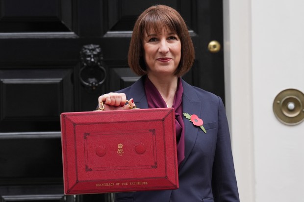 a woman holding a red briefcase that says ' creation of the envelope ' on it