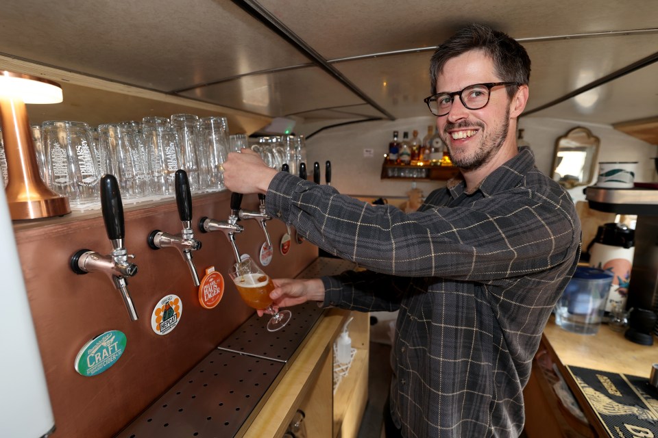 James pouring out one of the local pints on tap