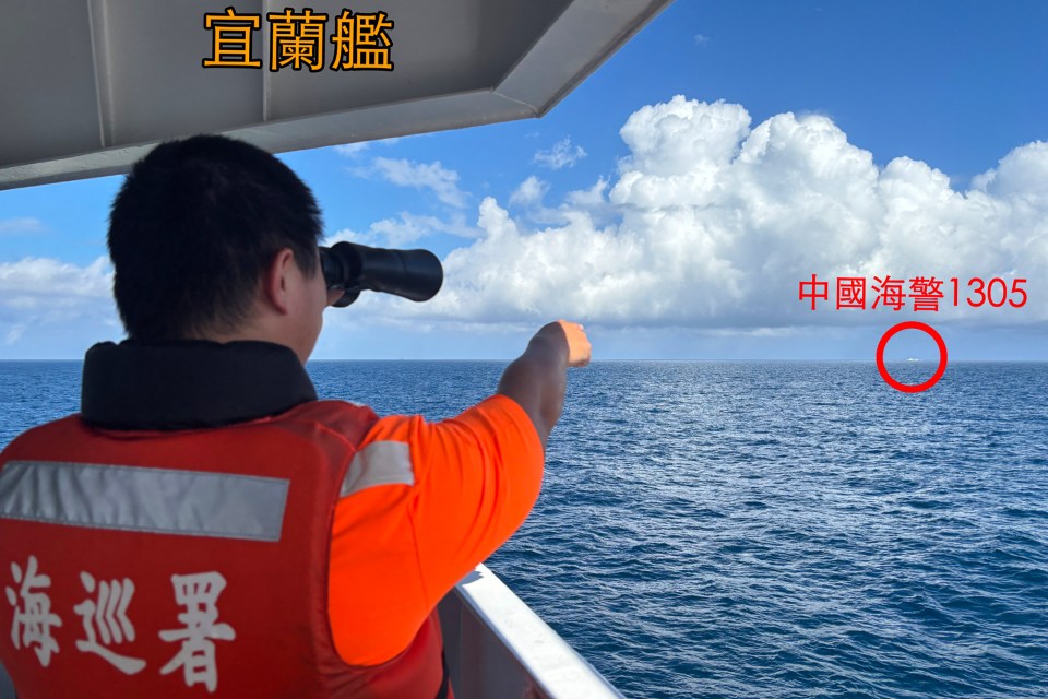 The Taiwan Coast Guard monitoring a Chinese Coast Guard ship sailing in the distance