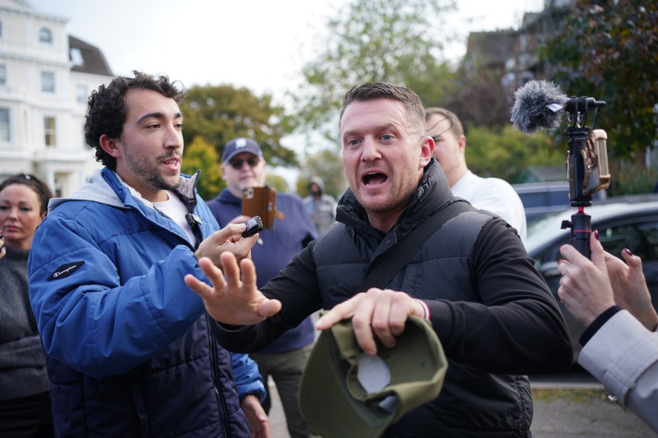 a man in a blue jacket with the word columbia on it