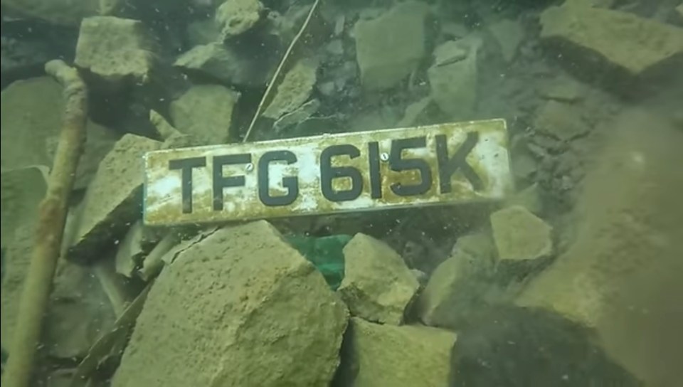 a license plate that says tfg 615k on it