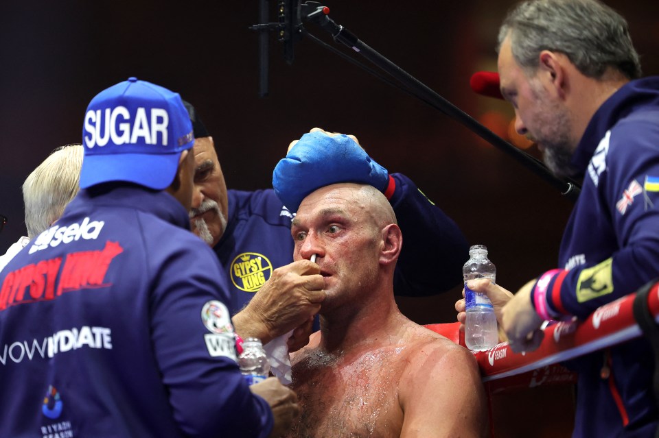 a man wearing a blue hat that says sugar on it