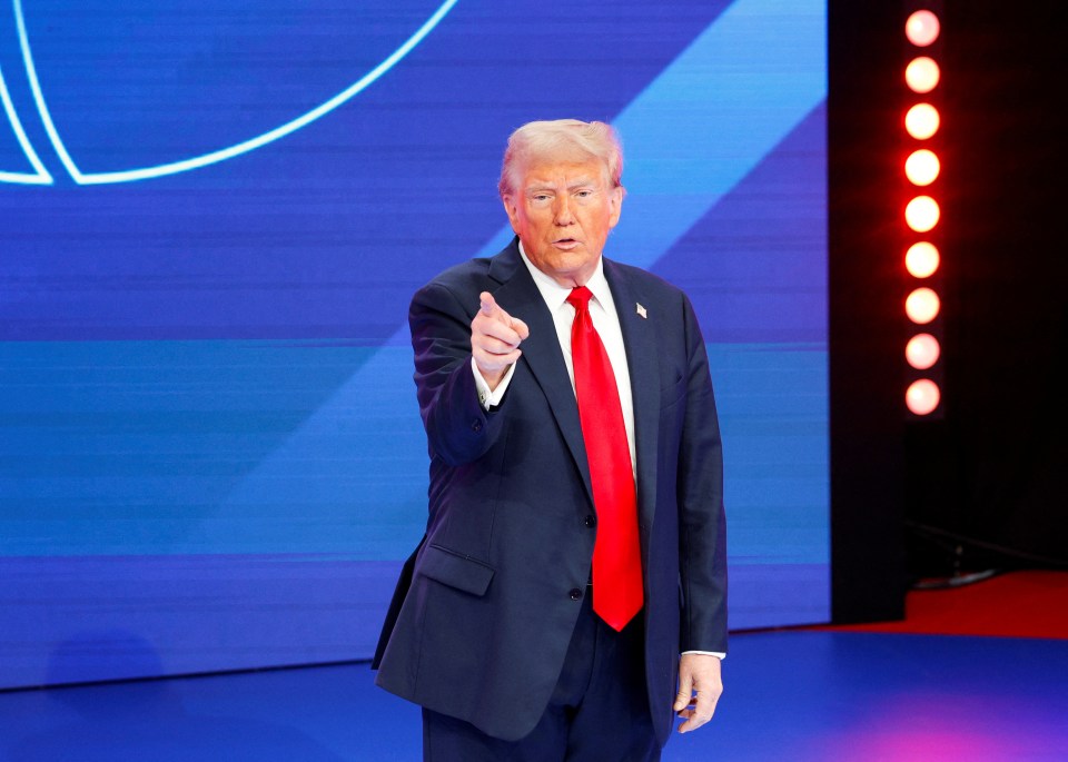 Donald Trump gestures as he takes part in a town hall in Doral, Florida on Wednesday