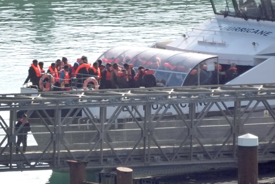 Survivors were brought ashore after the dinghy sunk in the Channel