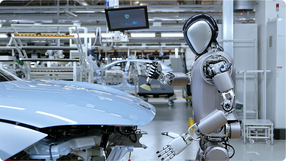 A 'Walker S1' humanoid robot working on a car inside a BYD Auto factory in China.