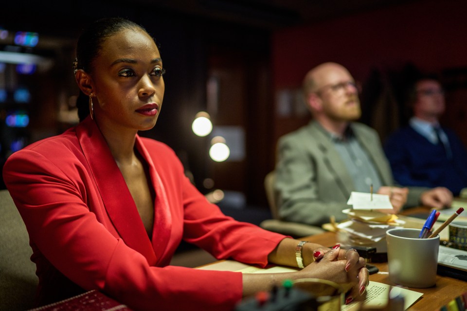 Nafessa Williams’ character Cameron Cook sports a punchy red blazer