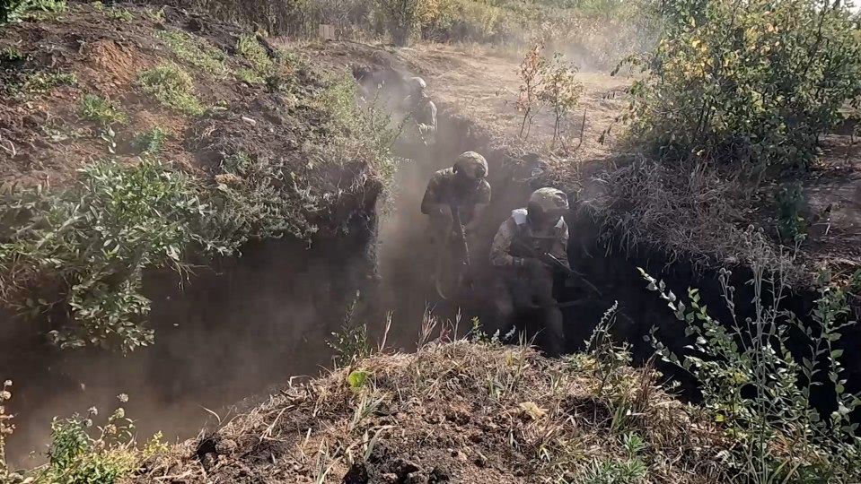 Russian contract servicemen train near combat zone ahead of assault missions in Ukraine in undated footage