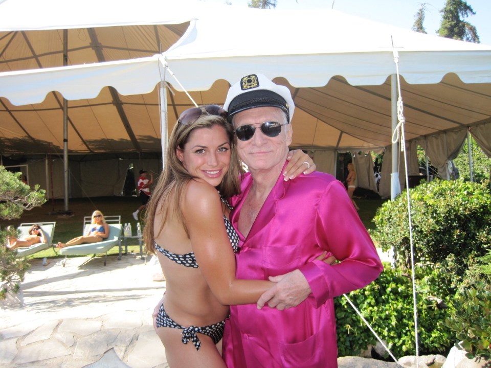 Gorgeous Louise in her 20s with Playboy boss Hugh Hefner