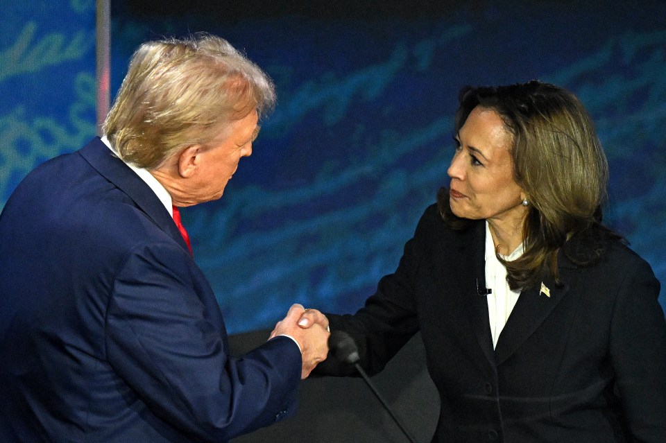 Kamala Harris shakes hands with Trump during a presidential debate in September