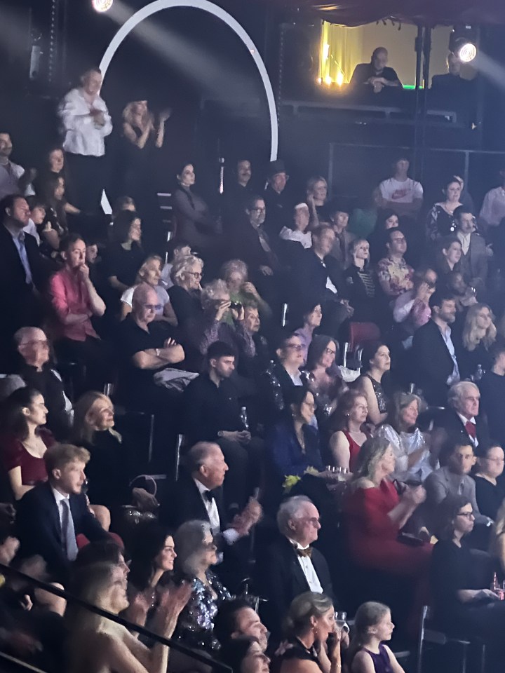 Sir Ian McKellen using binoculars at the Greatest Showman launch