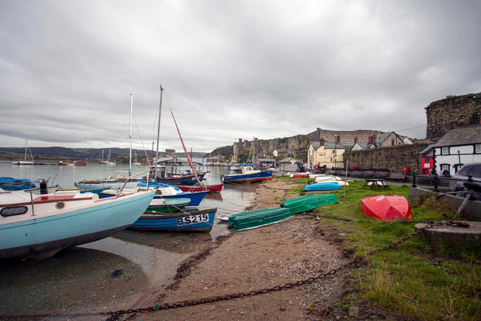 The property is situated on the quay front at Conwy, to the right in the picture, with Conwy castle some 500 yards away from the house