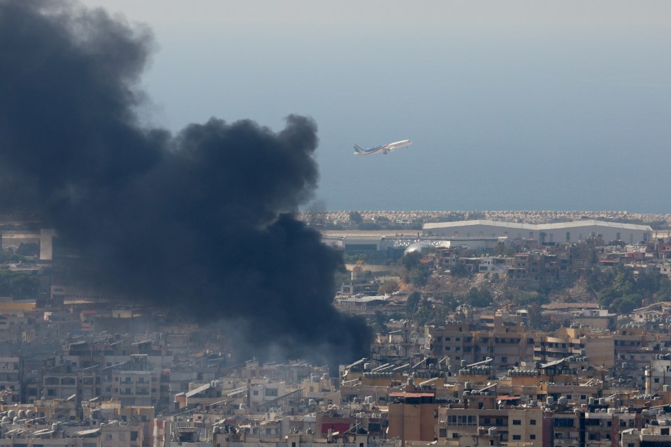 Smoke rises in Beirut's southern suburbs after a strike