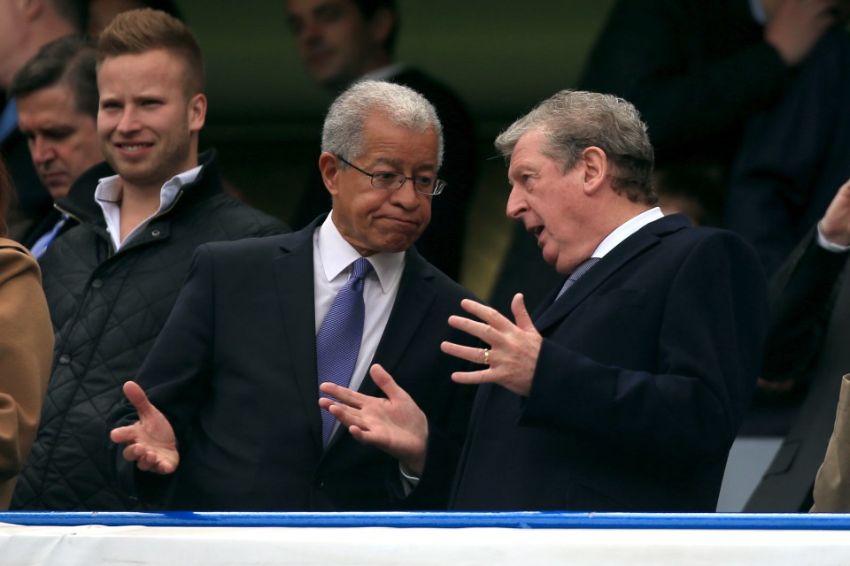 Lord Ouseley with then England manager Roy Hodgson, right, in the stands during a match at Stamford Bridge in May 2015