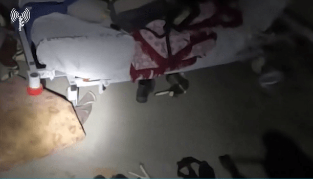 Shoes and other personal belongings were seen in this hospital room