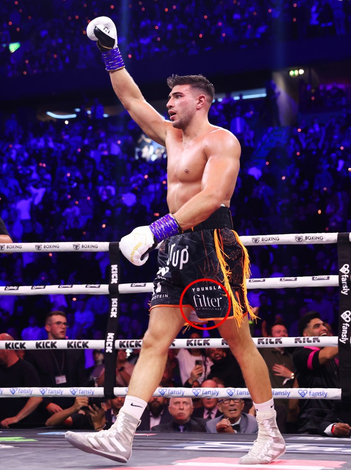 a boxer with the word filter on his shorts