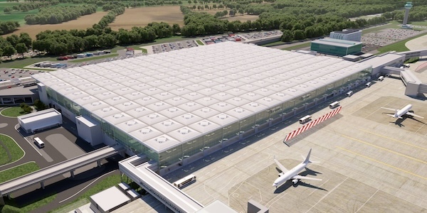 an aerial view of an airport with planes on the tarmac