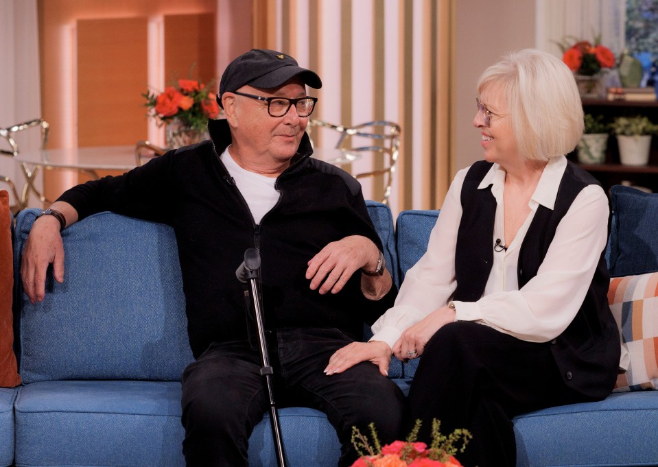 a man and a woman are sitting on a couch and the caption says legendary hairdresser trevor sorbie