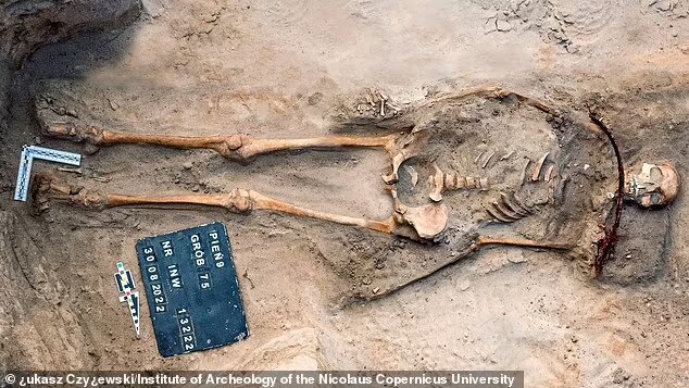 The 350-year-old skeleton was found with a sickle around her neck and a padlock on her toe