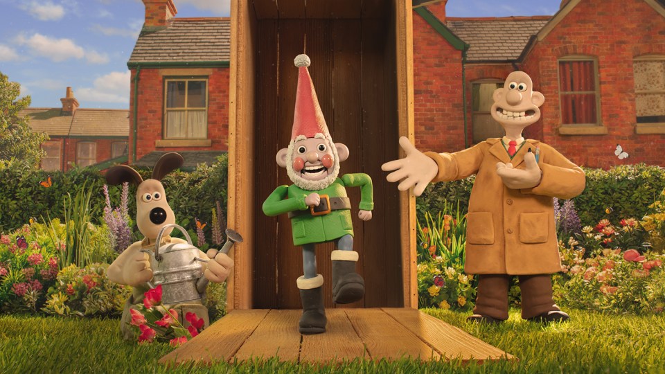 three cartoon characters are standing in front of a brick house