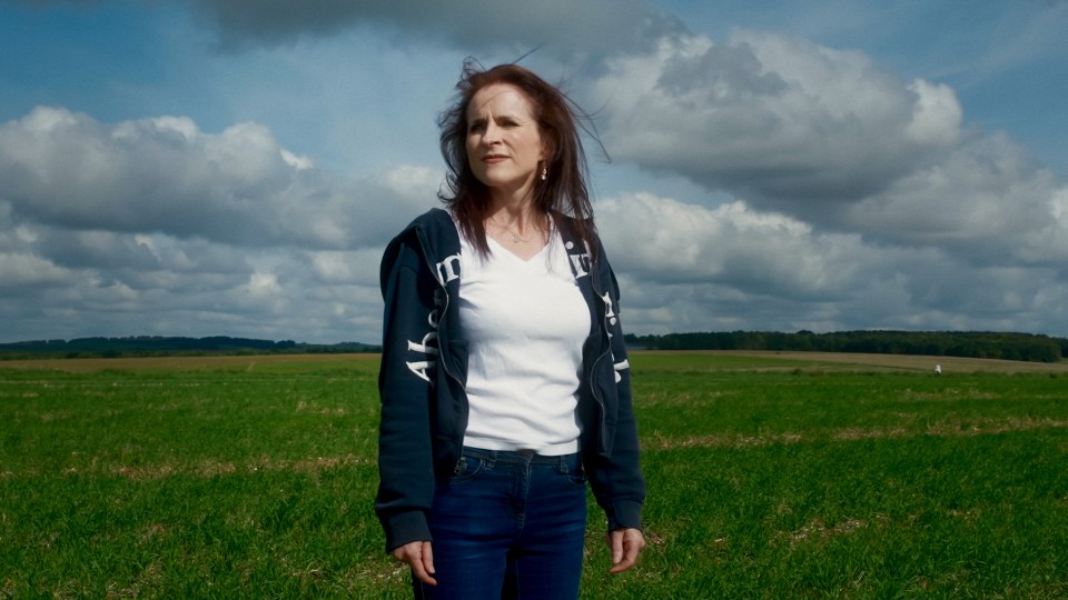 Victoria pictured back at the field where she landed after the parachute failed