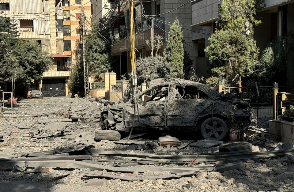 A decimated car following an Israeli strike on Beirut’s southern suburbs today