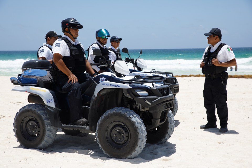 Violence soars in Mexican hotspot popular with British tourists as heavily-armed cops patrol the beaches of Cancun