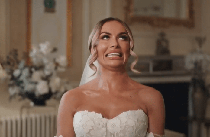 a woman in a wedding dress is making a funny face