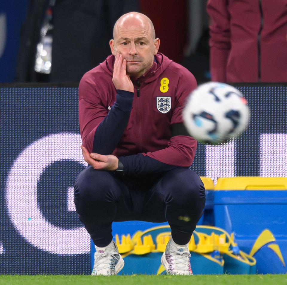 a man in a maroon jacket with the number 5 on it