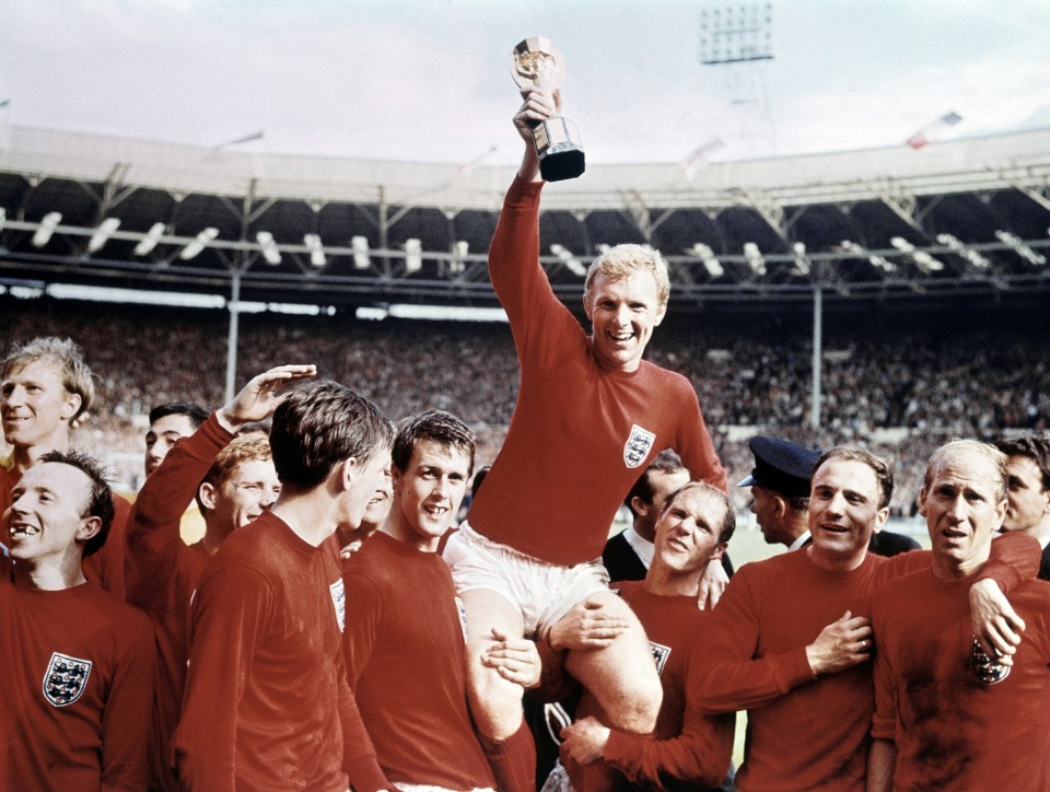 a man in a red shirt with the word england on it