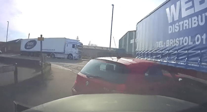 The trailer swings out and smashes the motor's bonnet