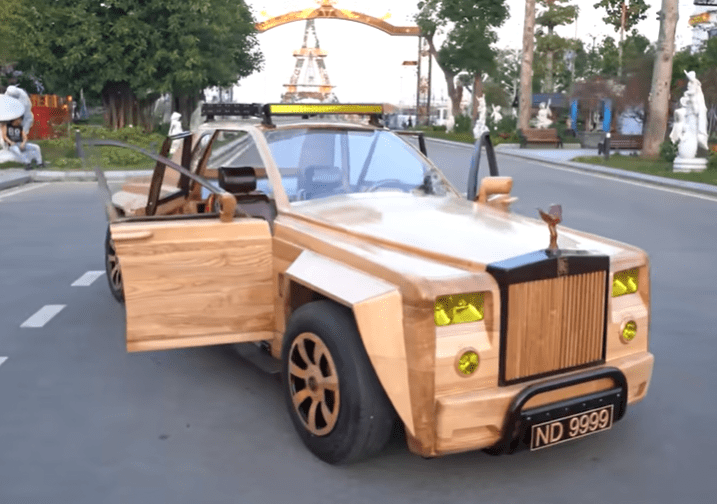 A carpenter has built a mini Rolls-Royce for his son using planks of wood