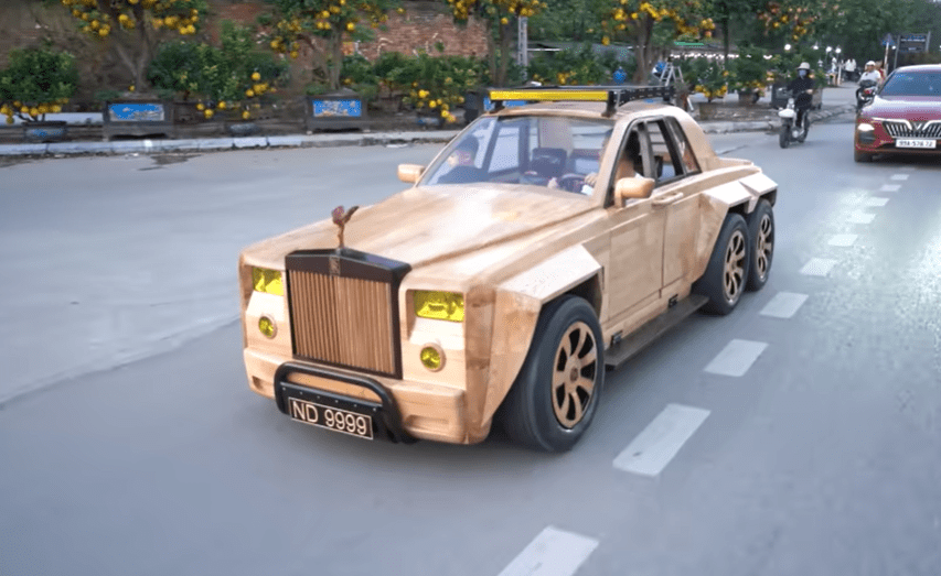 Upon completion, the Rolls-Royce hits the road with the carpenter's son sat in the passenger seat