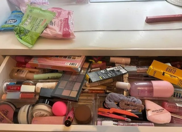 She shared these snaps of her messy make-up drawer