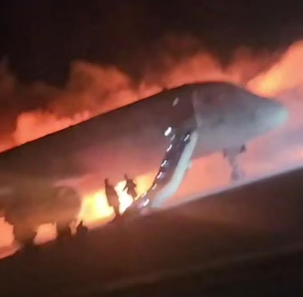 The passenger plane was engulfed in flames after it landed